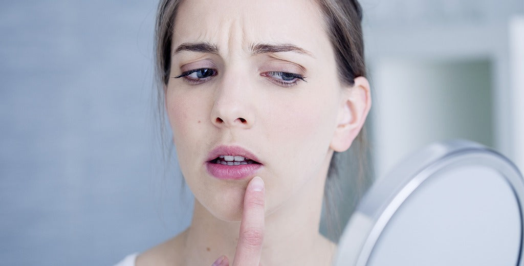 Here’s Exactly How to Get Rid of a Lip Pimple, According to Dermatologists