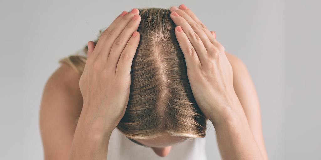Supergoop Just Launched a Sunscreen for Your Scalp With SPF 45, the Poof Part Powder