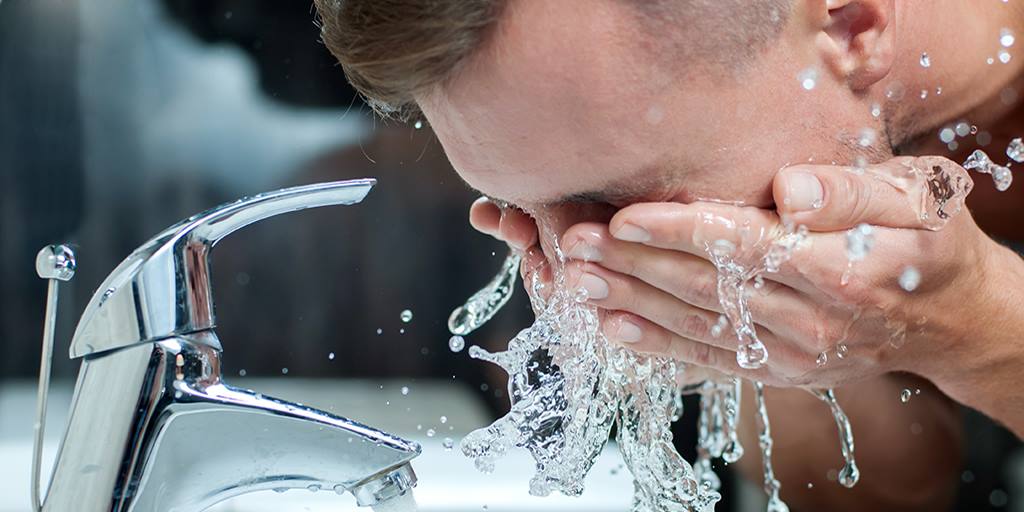 Fungal acne isn’t *really* acne at all—it’s more like facial dandruff